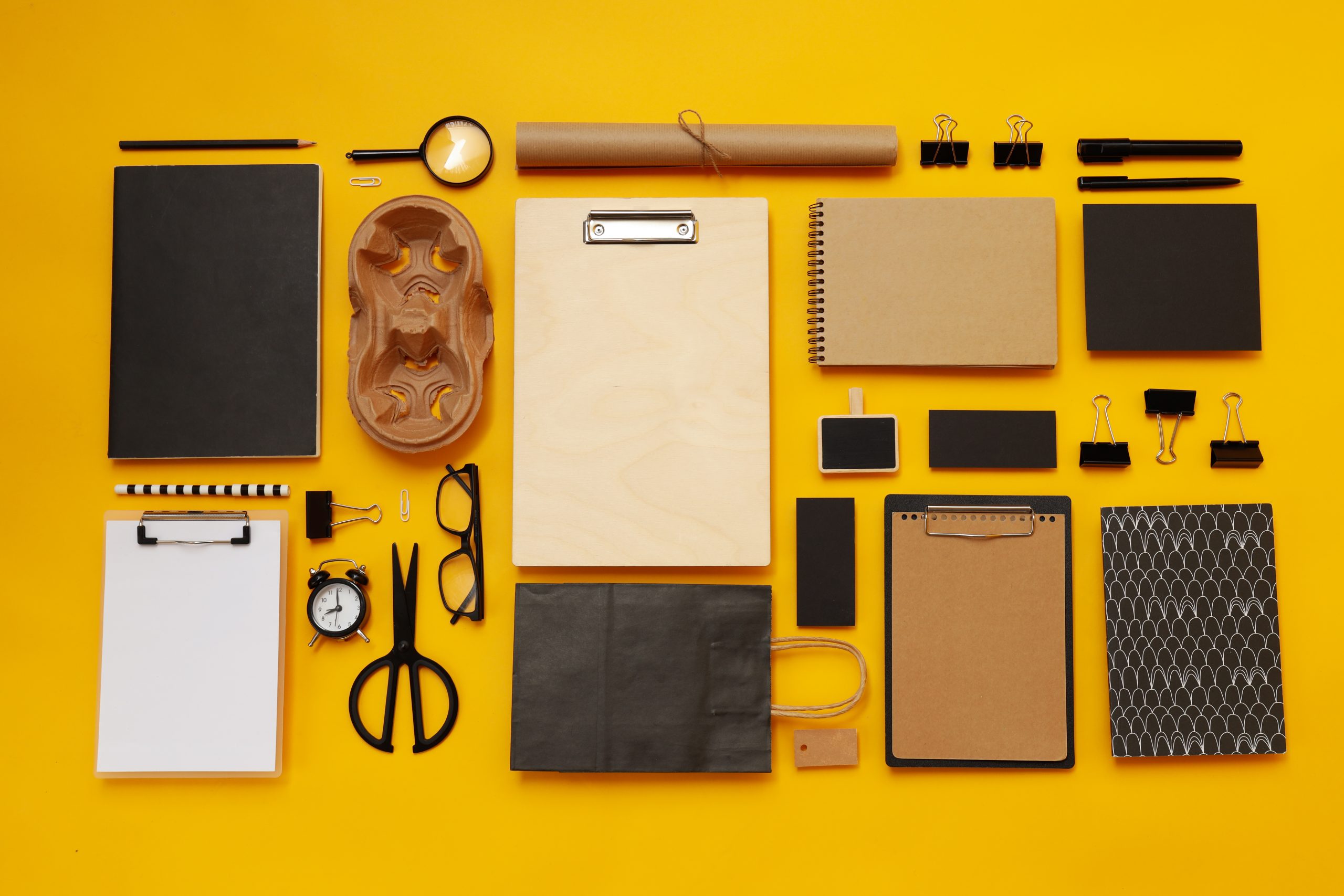 Mockup flat lay with different office accessories on yellow back